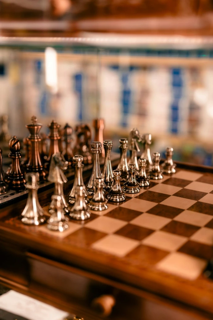 A close up of a chess set on a table
